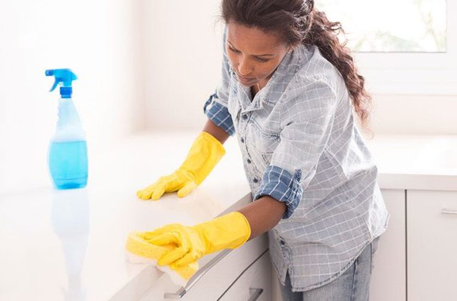 Woman clean the kitchen